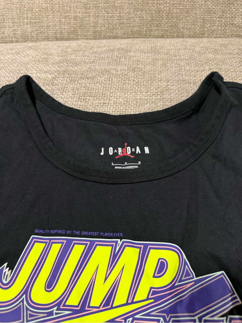 Jordan Black Graphic 'JUMP' Short Sleeve Tee with Yellow & Purple Print